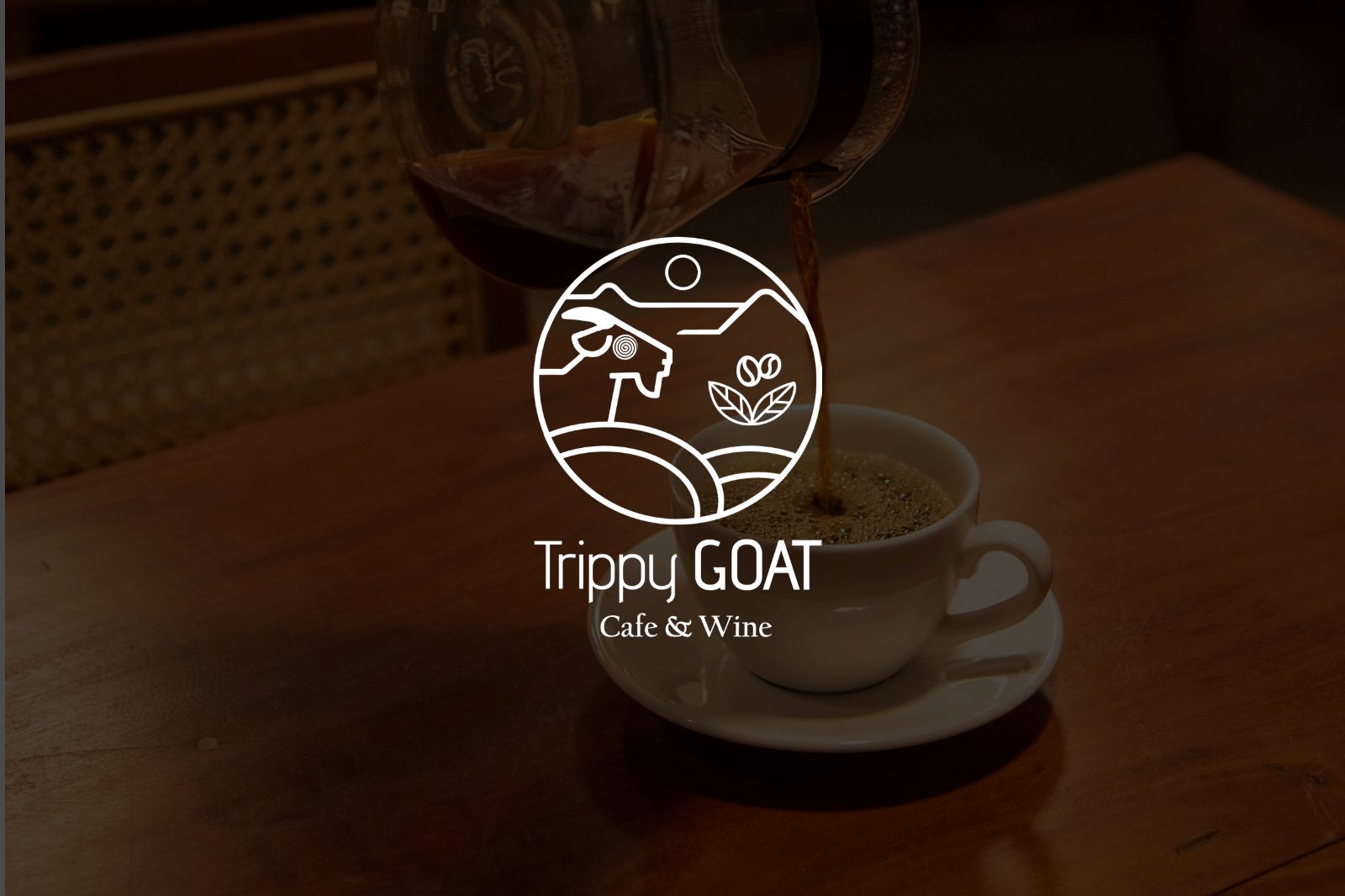 Trippy Goat brand mark on a coffee setting